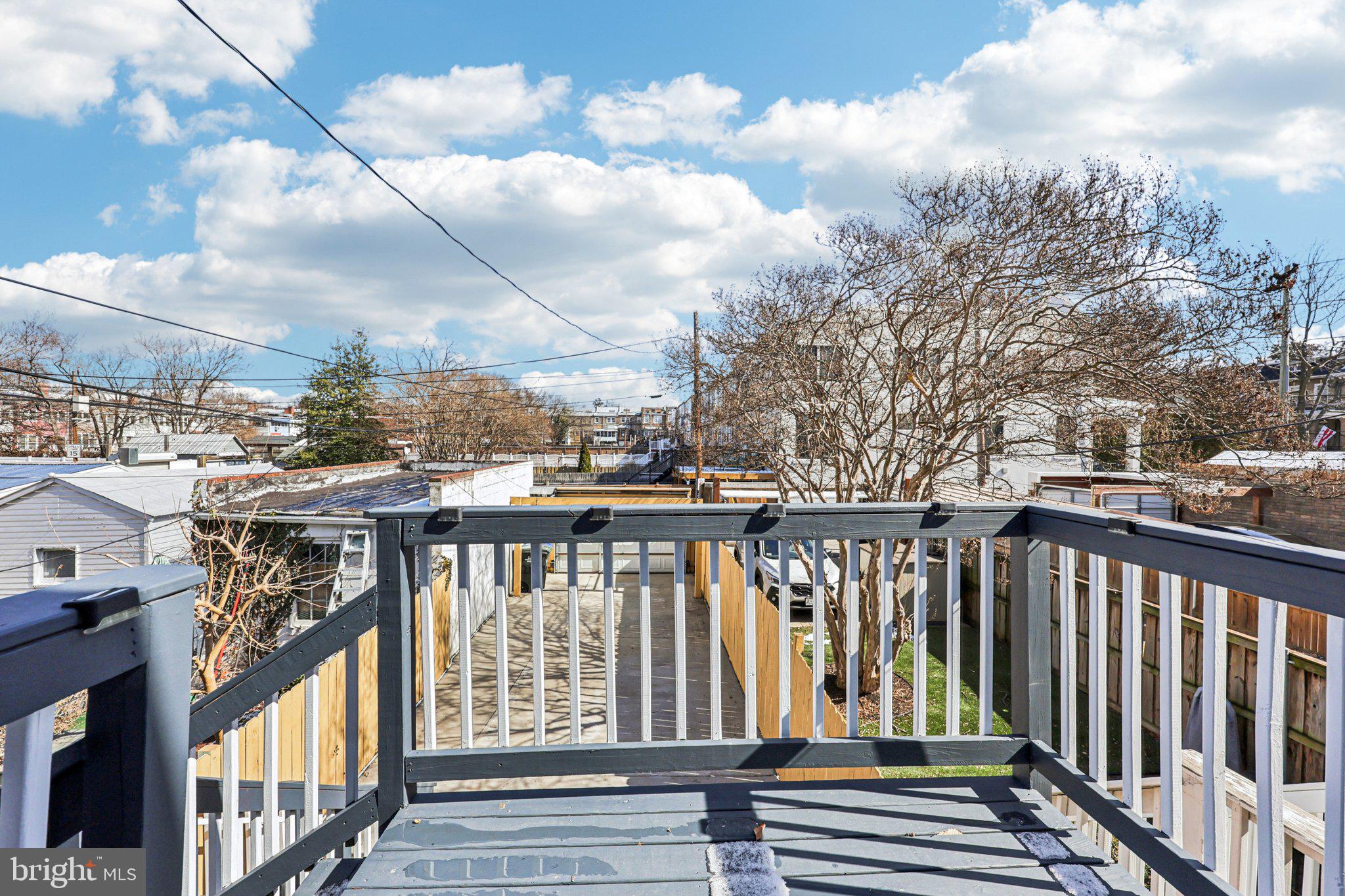 5209 5th Street Northwest Washington, DC 20011 - Photo 29 of 38 a view of a balcony with wooden fence