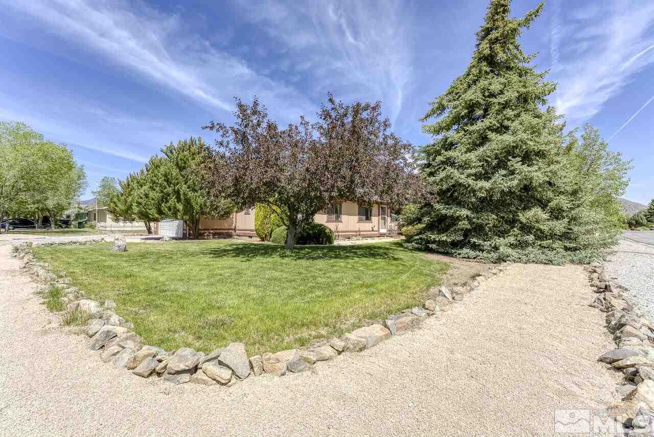 17625 Macaw Lane Reno, NV 89508 - Photo 3 of 40 a front view of a house with garden