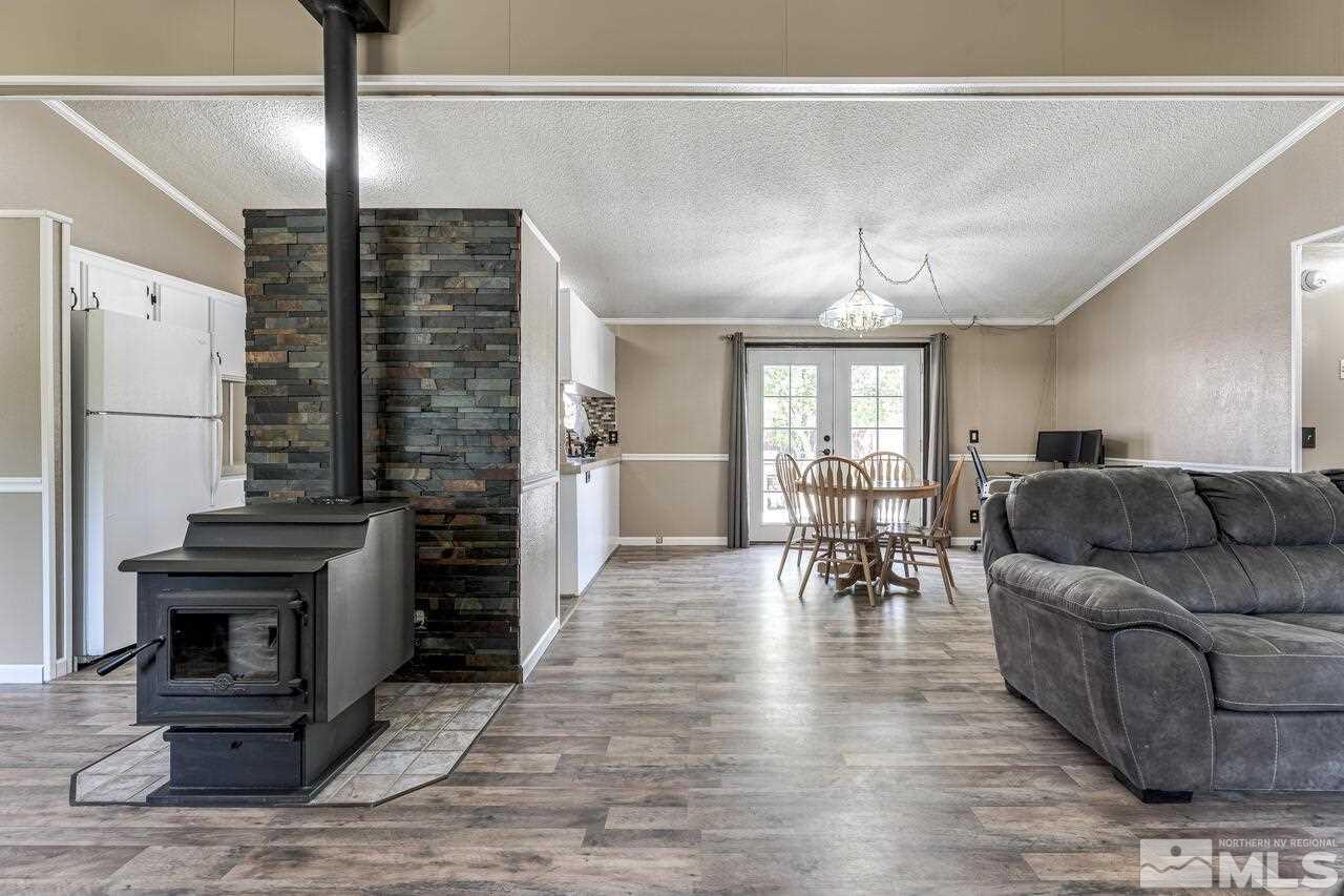 17625 Macaw Lane Reno, NV 89508 - Photo 7 of 40 a living room with furniture and a fireplace