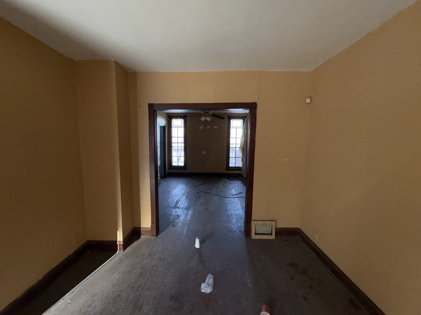 4940 West Superior Street Chicago, IL 60644 - Photo 2 of 7 a view of a hallway with wooden floor