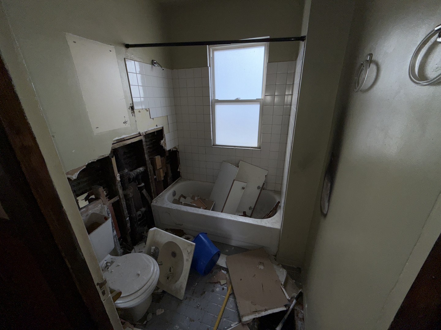 4940 West Superior Street Chicago, IL 60644 - Photo 7 of 7 a bathroom with a sink toilet and shower