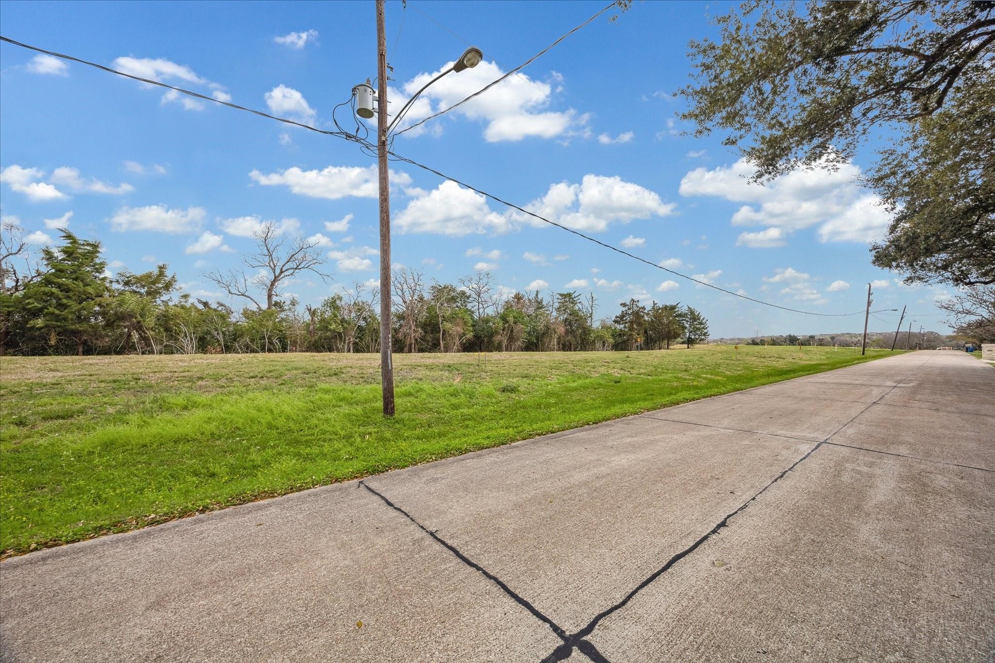 19605 Old Galveston Road Webster, TX 77598 - Photo 2 of 6 a view of a house with a big yard