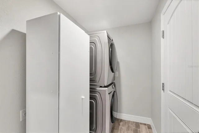 a view of a chairs and table in patio