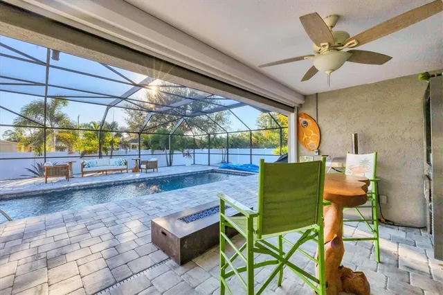 a view of a swimming pool with a patio