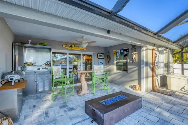 a view of a swimming pool with a patio