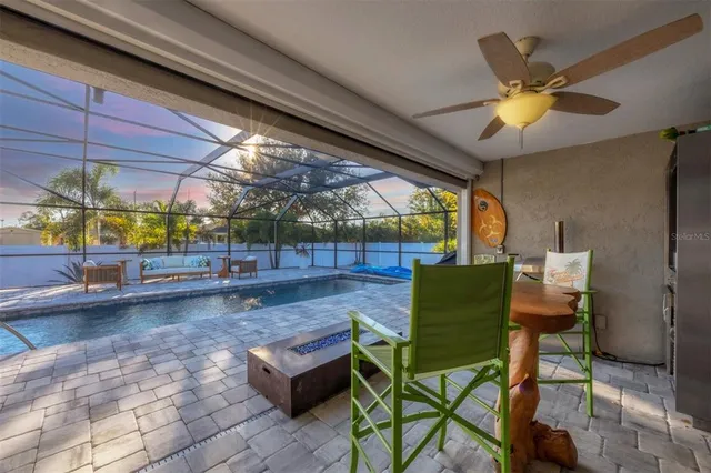 a view of a chairs and table in a patio