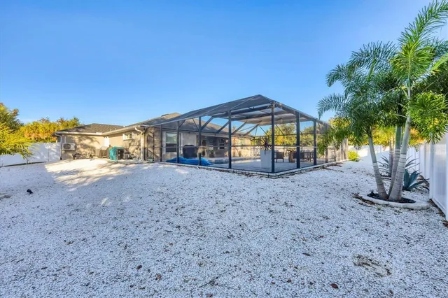 an aerial view of a house with a garden