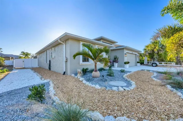 a front view of house with outdoor seating