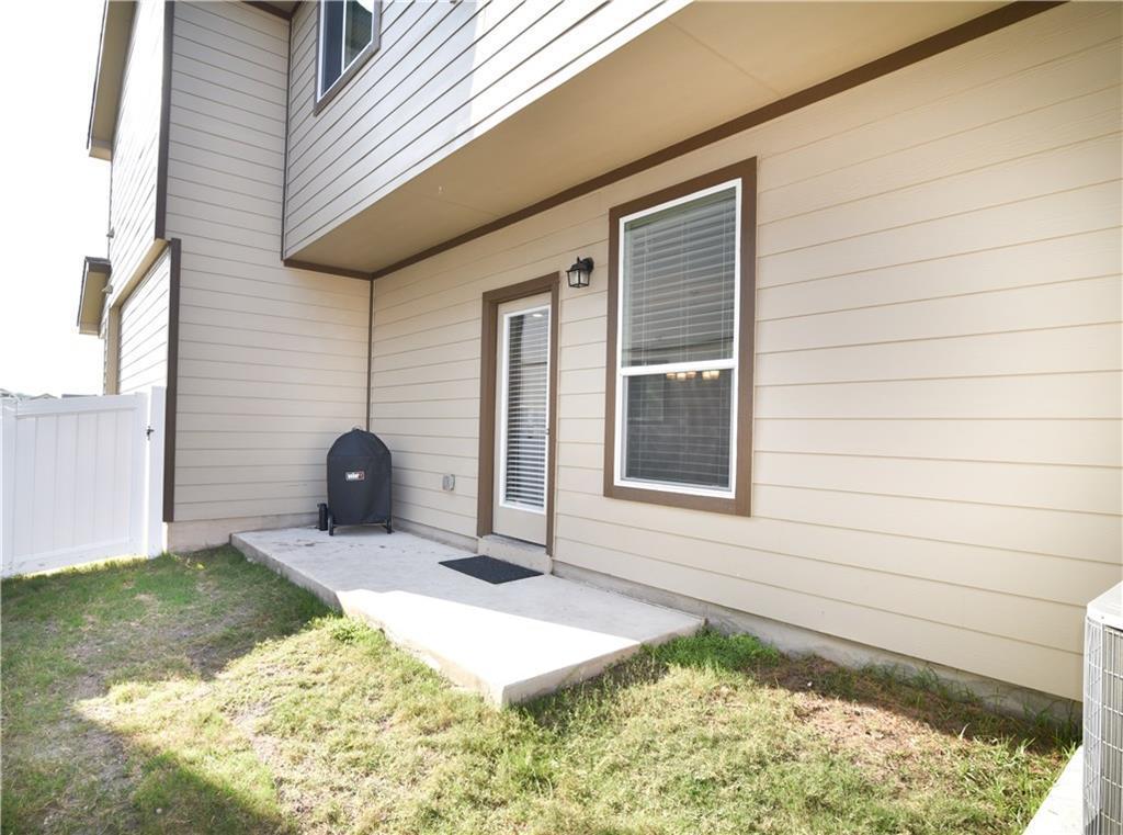 18405 Congaree Street Pflugerville, TX 78660 - Photo 24 of 26 a front view of a house with garden
