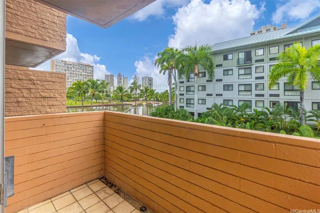 a view of a balcony with plants