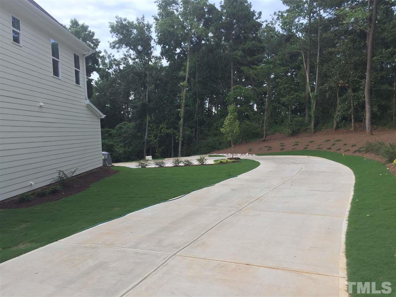 1076 Mills Street Raleigh, NC 27608 - Photo 3 of 16 a view of a park with tree s