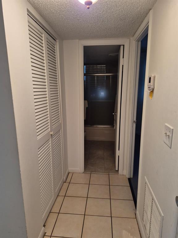 560 Southeast 2nd Avenue, Unit H2 Deerfield Beach, FL 33441 - Photo 15 of 23 a view of a closet area in a room