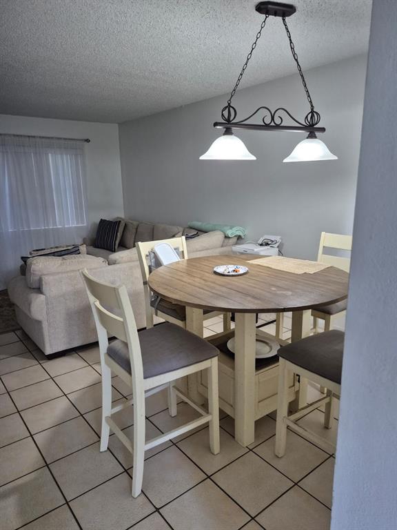 560 Southeast 2nd Avenue, Unit H2 Deerfield Beach, FL 33441 - Photo 8 of 23 a view of a dining room and livingroom
