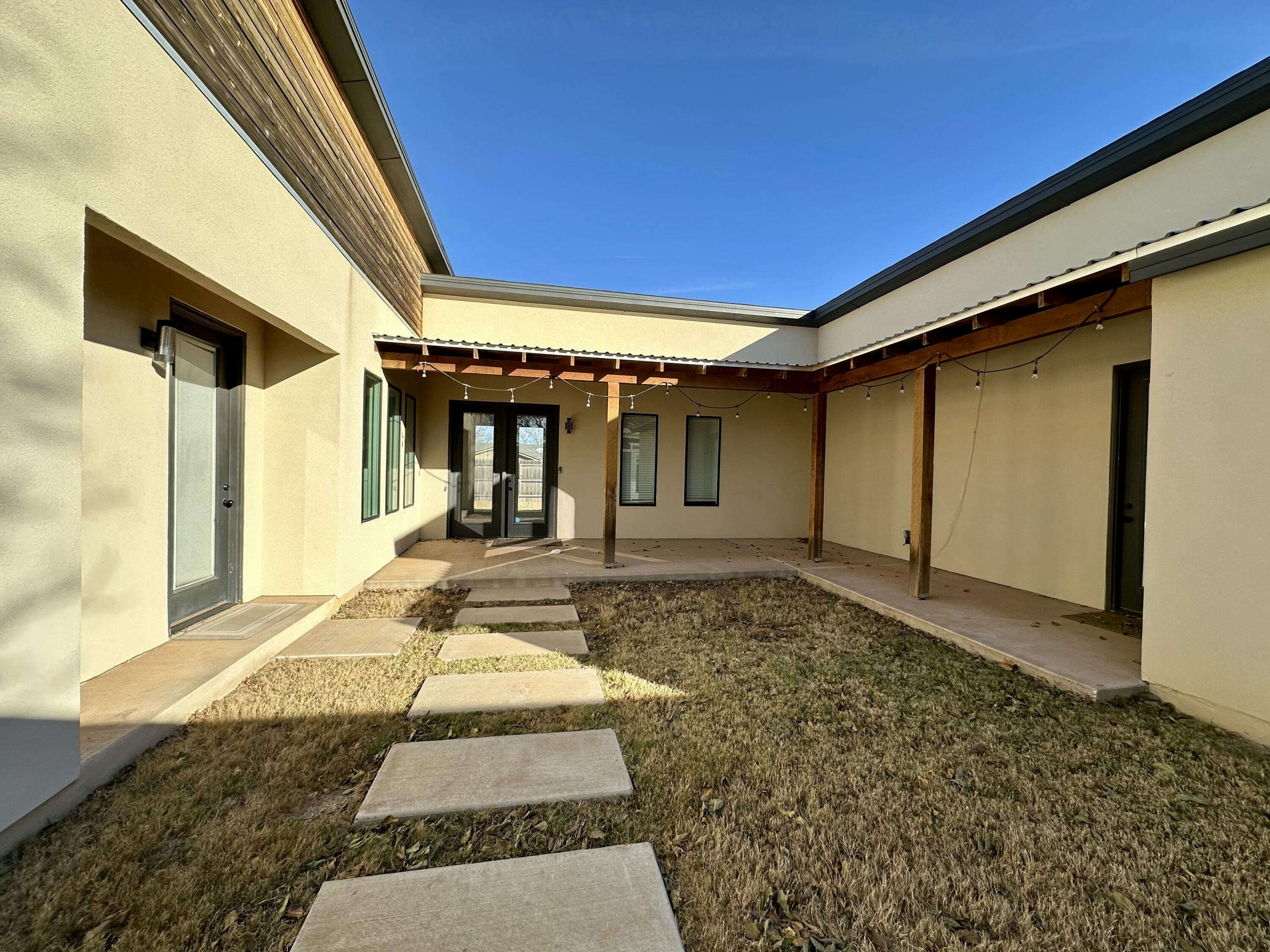 4816 7th Street Lubbock, TX 79416 - Photo 2 of 10 a view of a house with porch