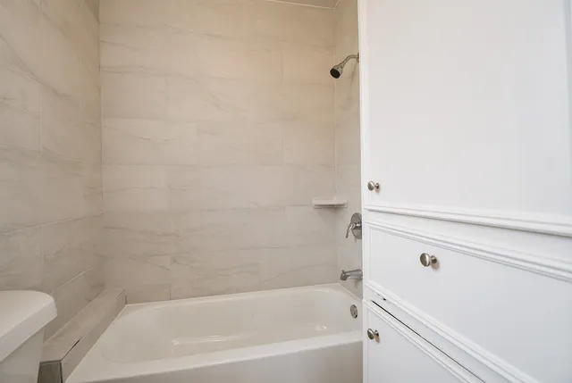 a bathroom with a bathtub