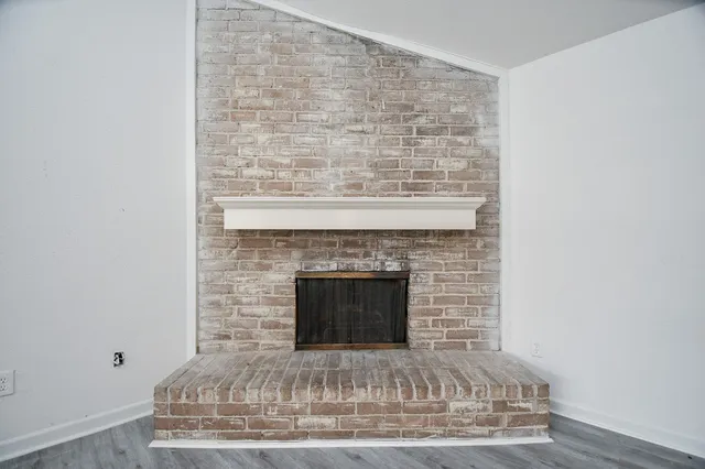 a living room with a fireplace
