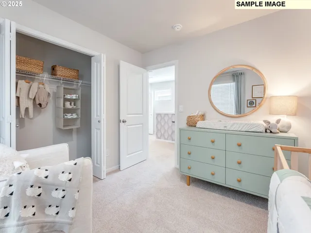 a bathroom with a double vanity sink mirror and shower