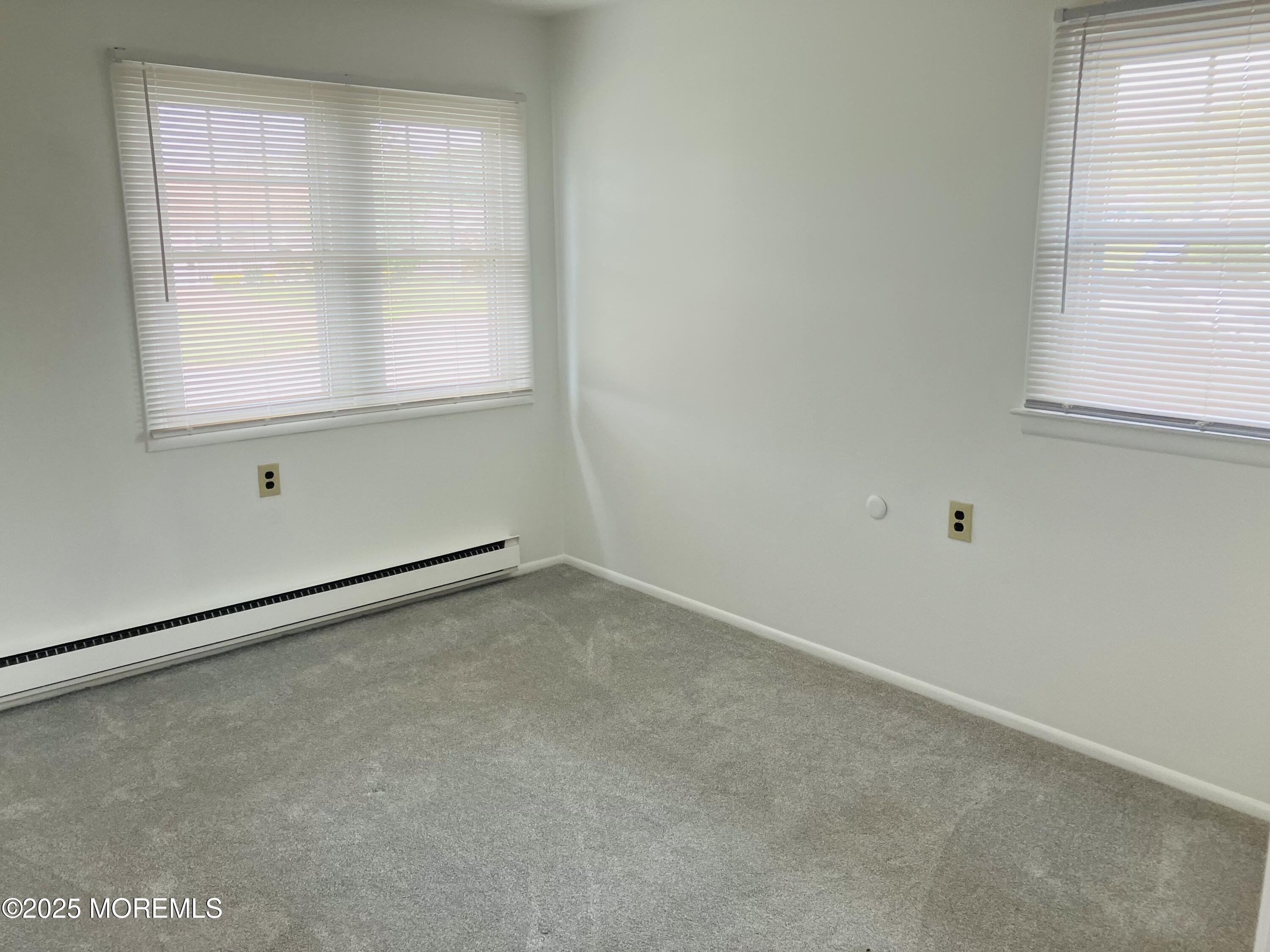 Undisclosed Address Brick, NJ 08724 - Photo 13 of 13 an empty room with a window