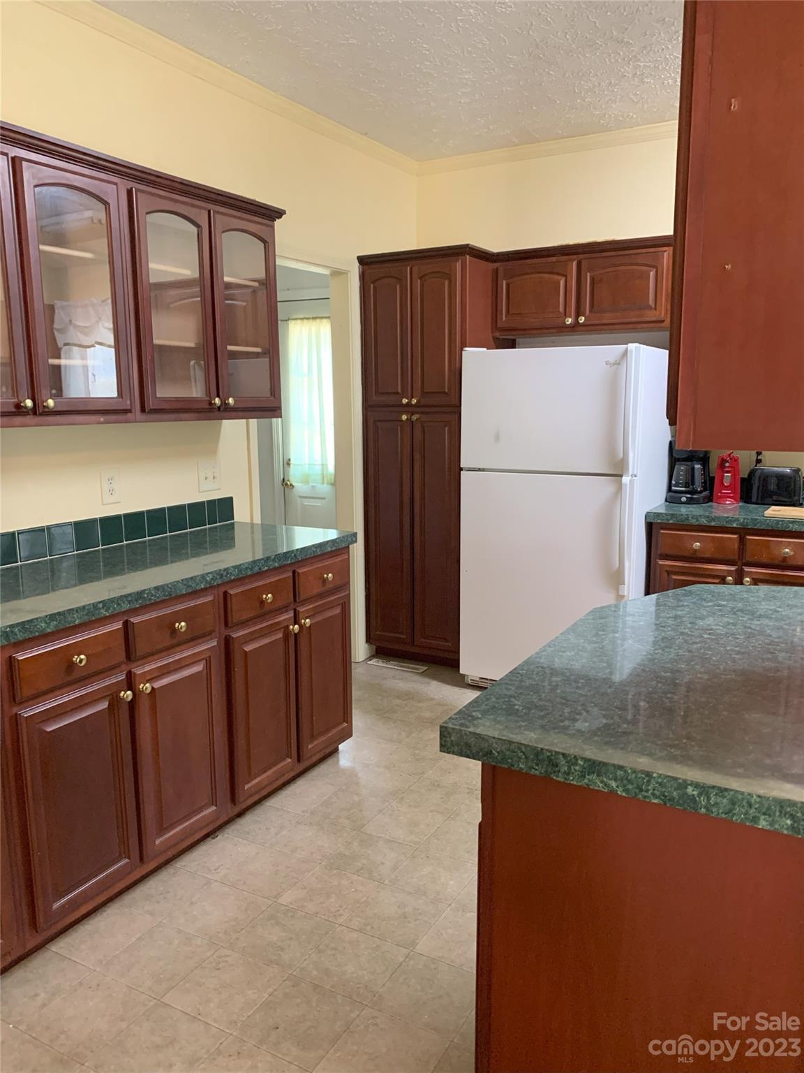 6417 Miller Road Kannapolis, NC 28081 - Photo 13 of 29 a kitchen with stainless steel appliances granite countertop a refrigerator and a stove