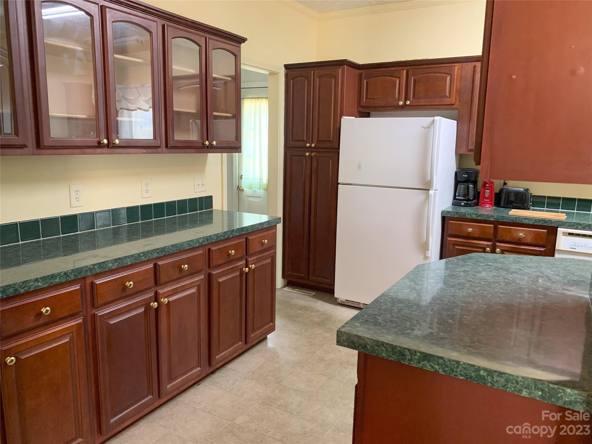 6417 Miller Road Kannapolis, NC 28081 - Photo 15 of 29 a kitchen with stainless steel appliances granite countertop a refrigerator and a stove