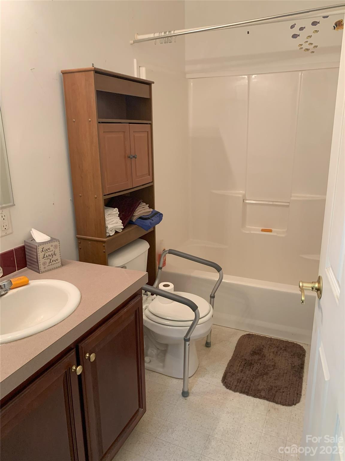 6417 Miller Road Kannapolis, NC 28081 - Photo 22 of 29 a bathroom with a sink a toilet and shower