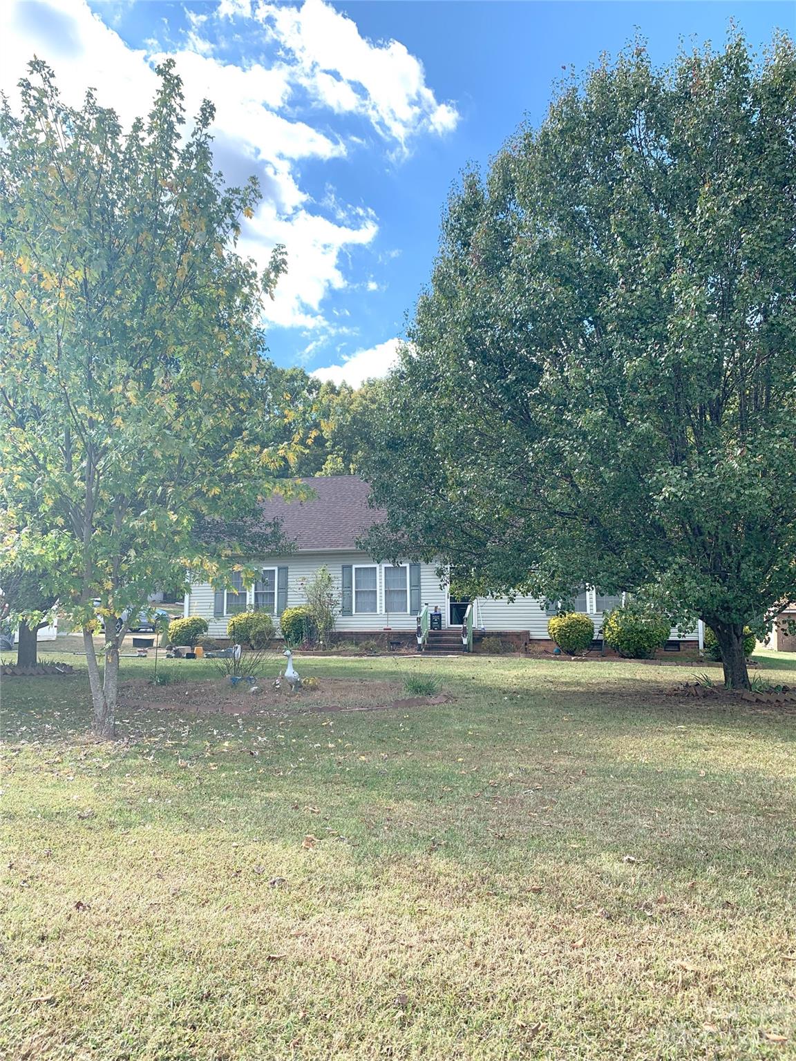 6417 Miller Road Kannapolis, NC 28081 - Photo 3 of 29 a view of a house with a yard