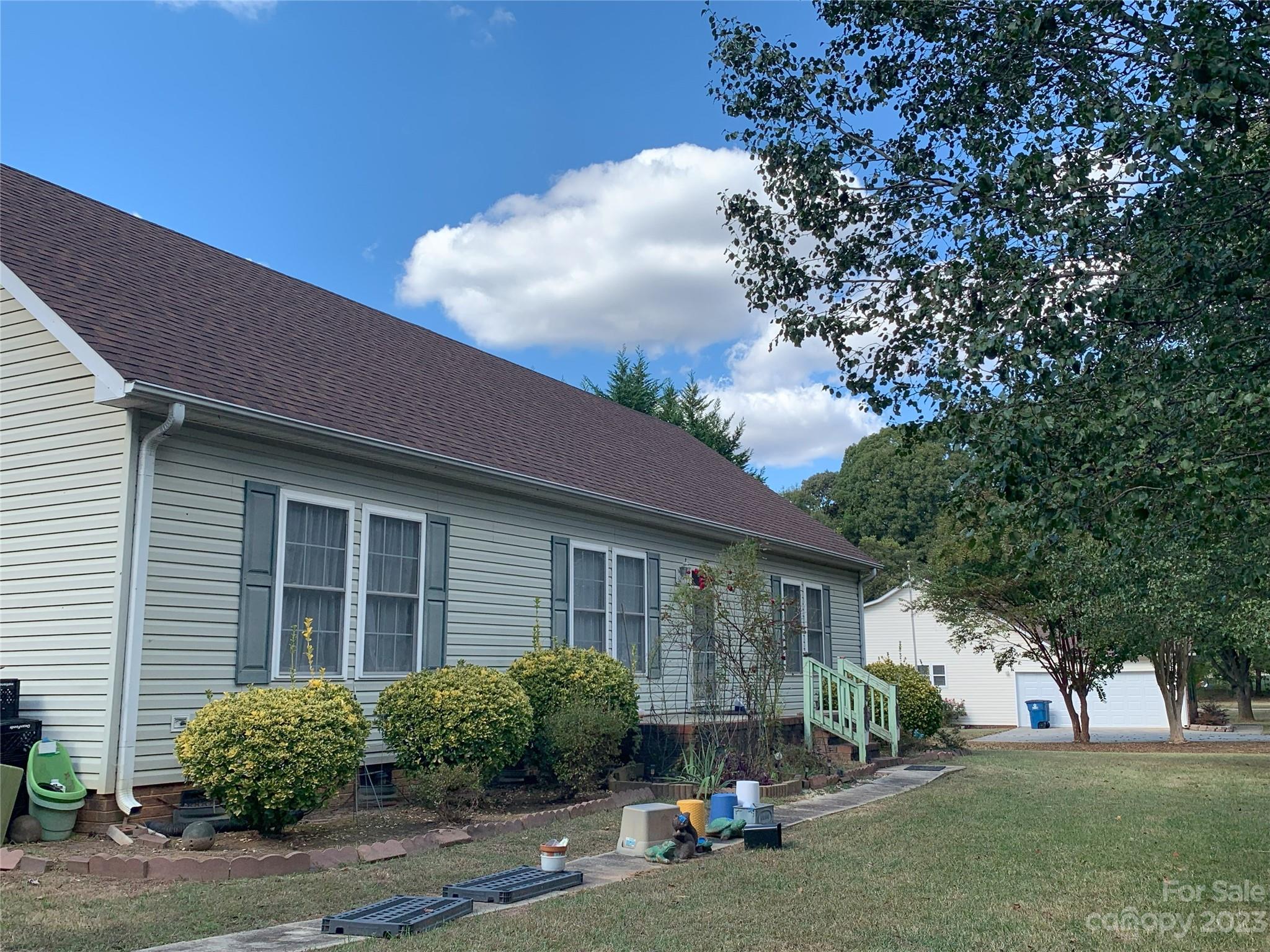 6417 Miller Road Kannapolis, NC 28081 - Photo 4 of 29 a view of a house with a patio