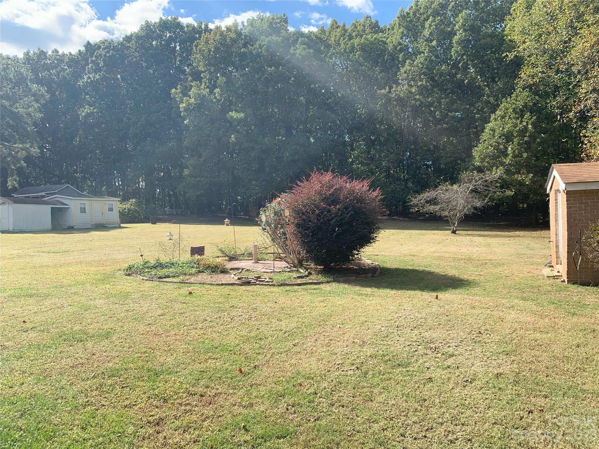 6417 Miller Road Kannapolis, NC 28081 - Photo 5 of 29 a view of swimming pool with a yard