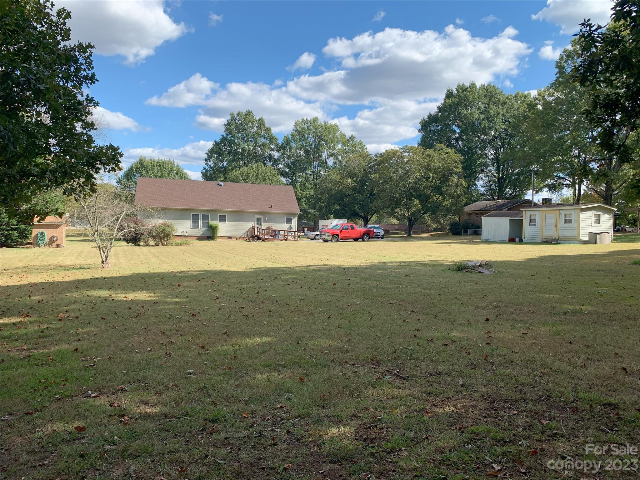 6417 Miller Road Kannapolis, NC 28081 - Photo 8 of 29 a view of a yard with a house and in the background