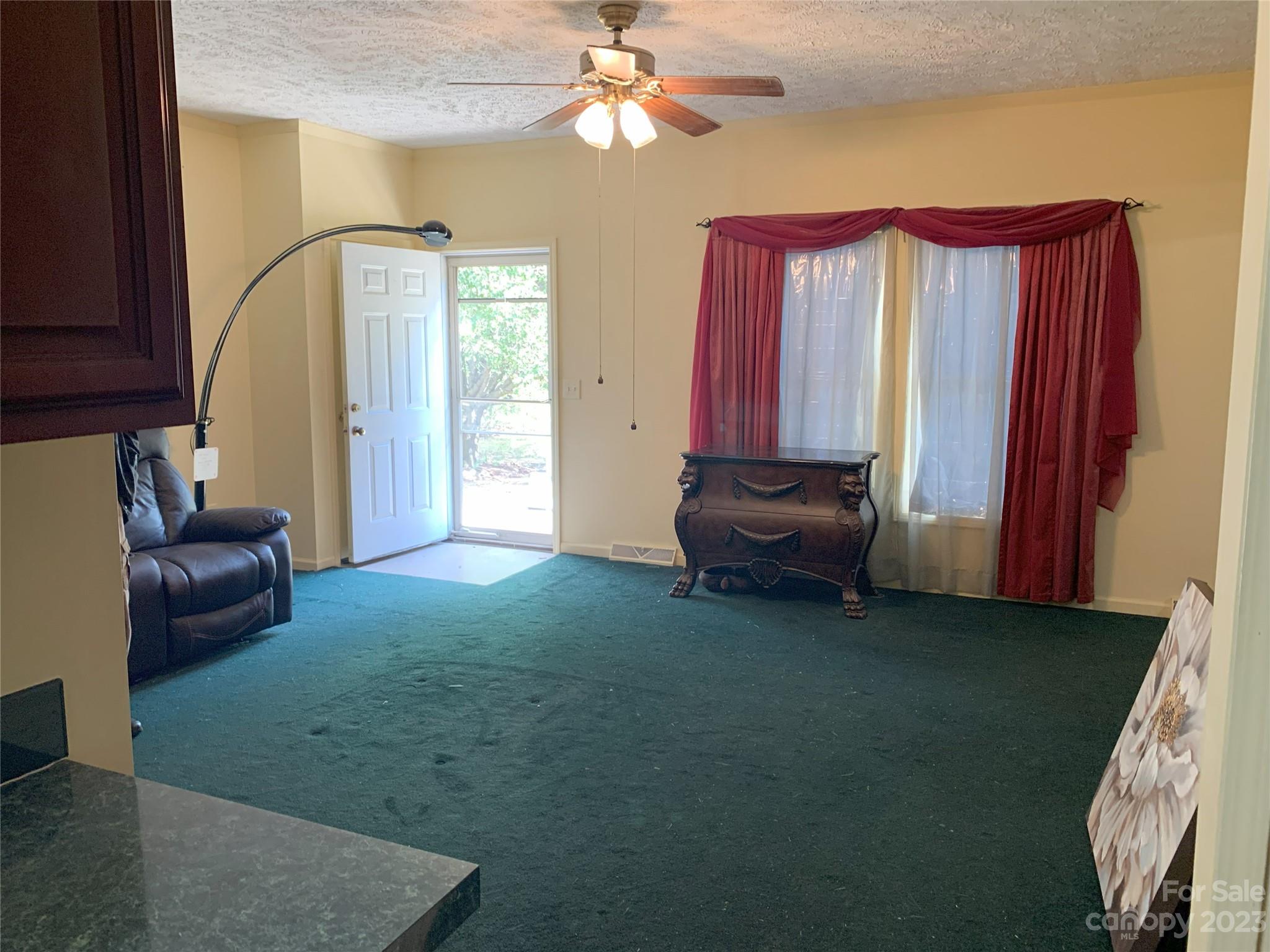 6417 Miller Road Kannapolis, NC 28081 - Photo 9 of 29 a living room with furniture and a window