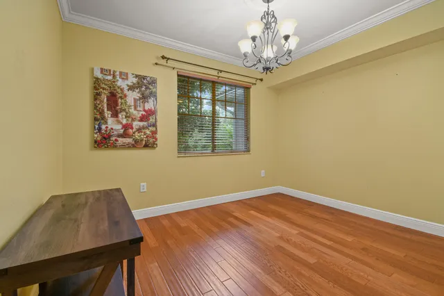 a view of livingroom with window and wooden floor