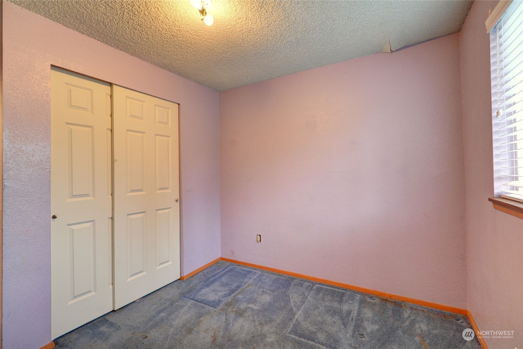 16913 29th Drive Southeast Bothell, WA 98012 - Photo 11 of 17 an empty room with windows