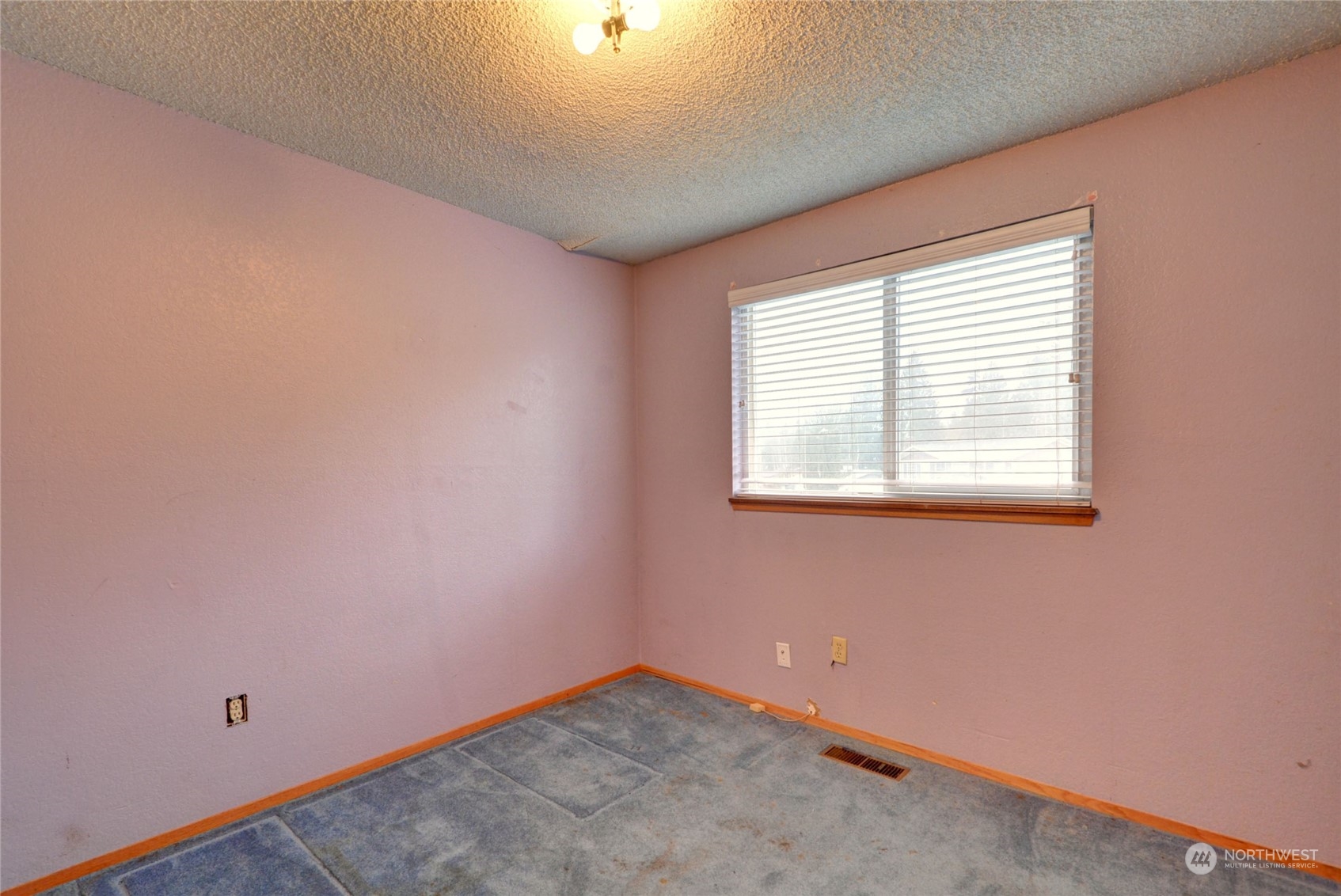 16913 29th Drive Southeast Bothell, WA 98012 - Photo 10 of 17 an empty room with a window