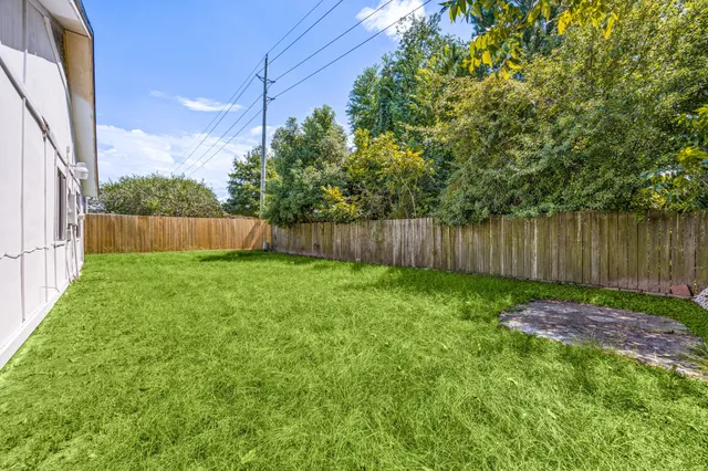 a view of outdoor space with deck and backyard
