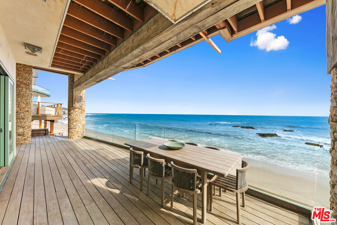 24920 Malibu Road Malibu, CA 90265 - Photo 37 of 49 a view of a balcony with wooden floor