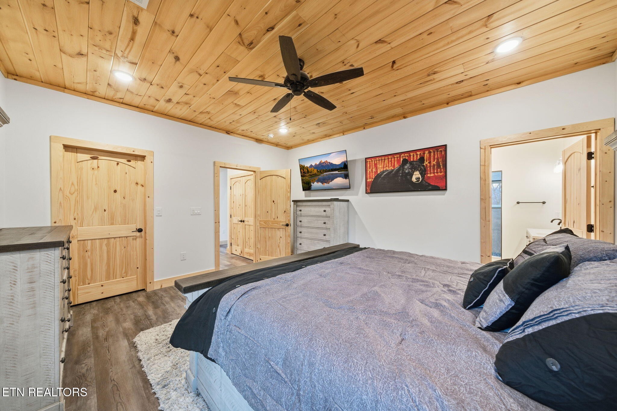 638 Ridge Top Loop Gatlinburg, TN 37738 - Photo 15 of 37 a bedroom with a bed and a walk in closet