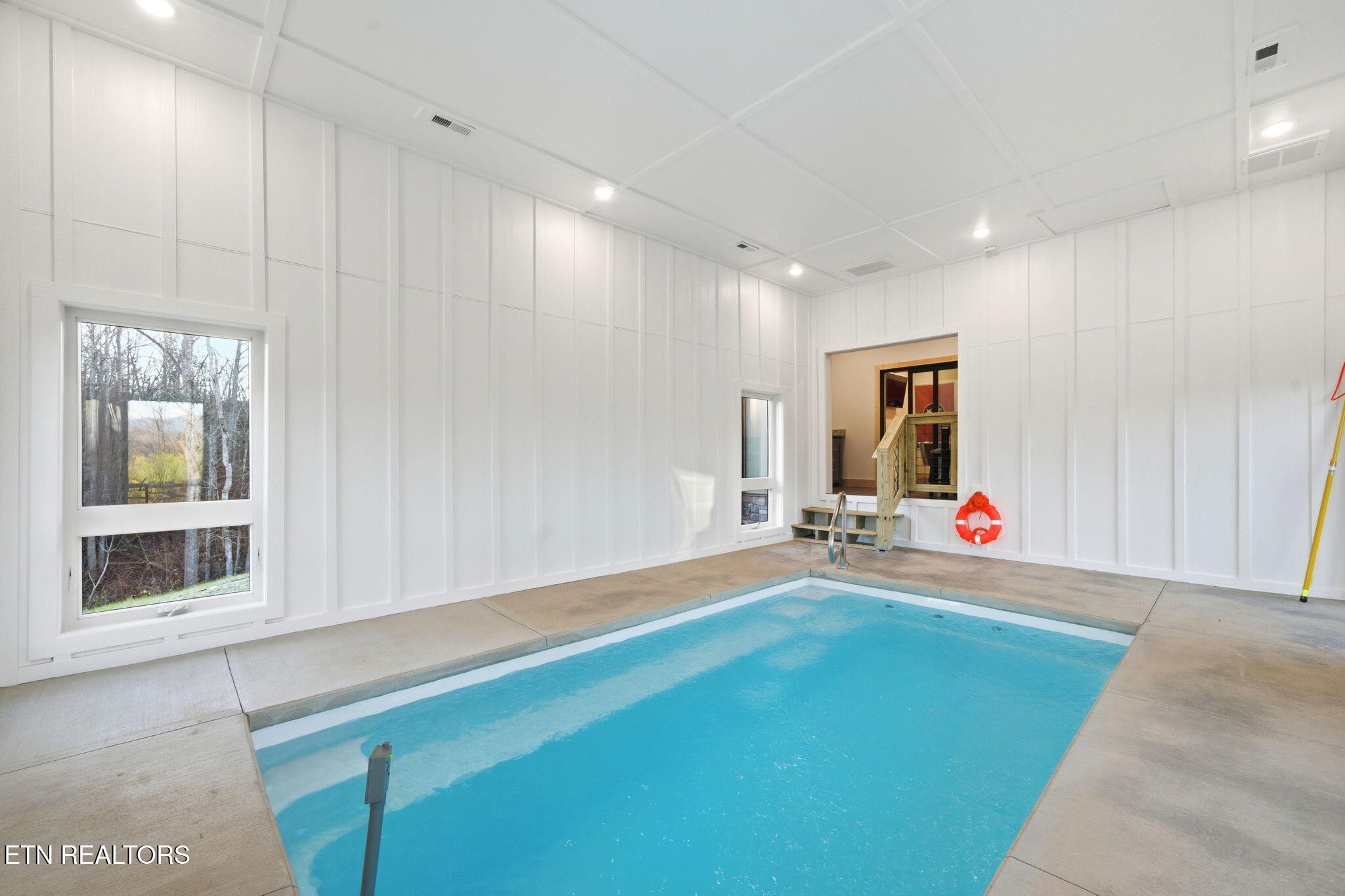 638 Ridge Top Loop Gatlinburg, TN 37738 - Photo 30 of 37 a view of a room with gym equipment and windows