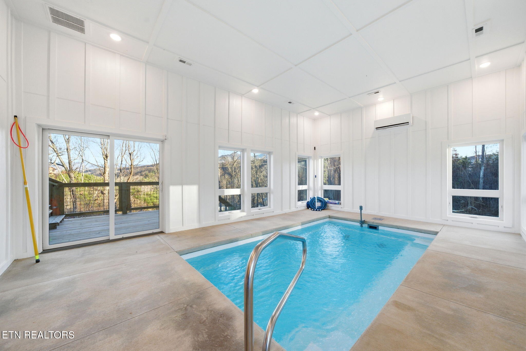 638 Ridge Top Loop Gatlinburg, TN 37738 - Photo 3 of 37 a large white kitchen with large windows and a large window