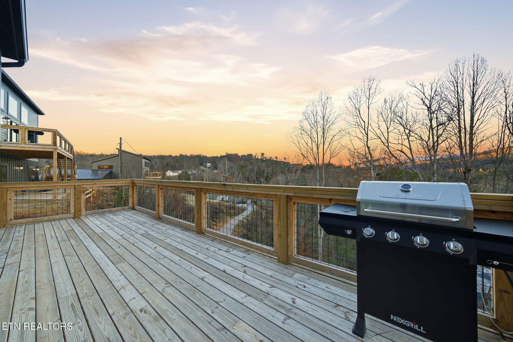 638 Ridge Top Loop Gatlinburg, TN 37738 - Photo 31 of 37 a view of a terrace with wooden floor and fence