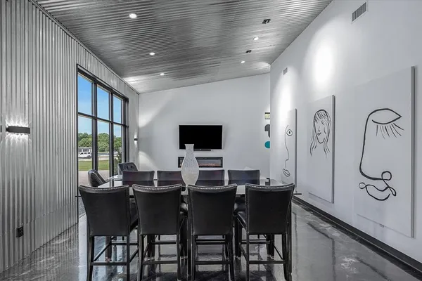 a view of a dining room with furniture