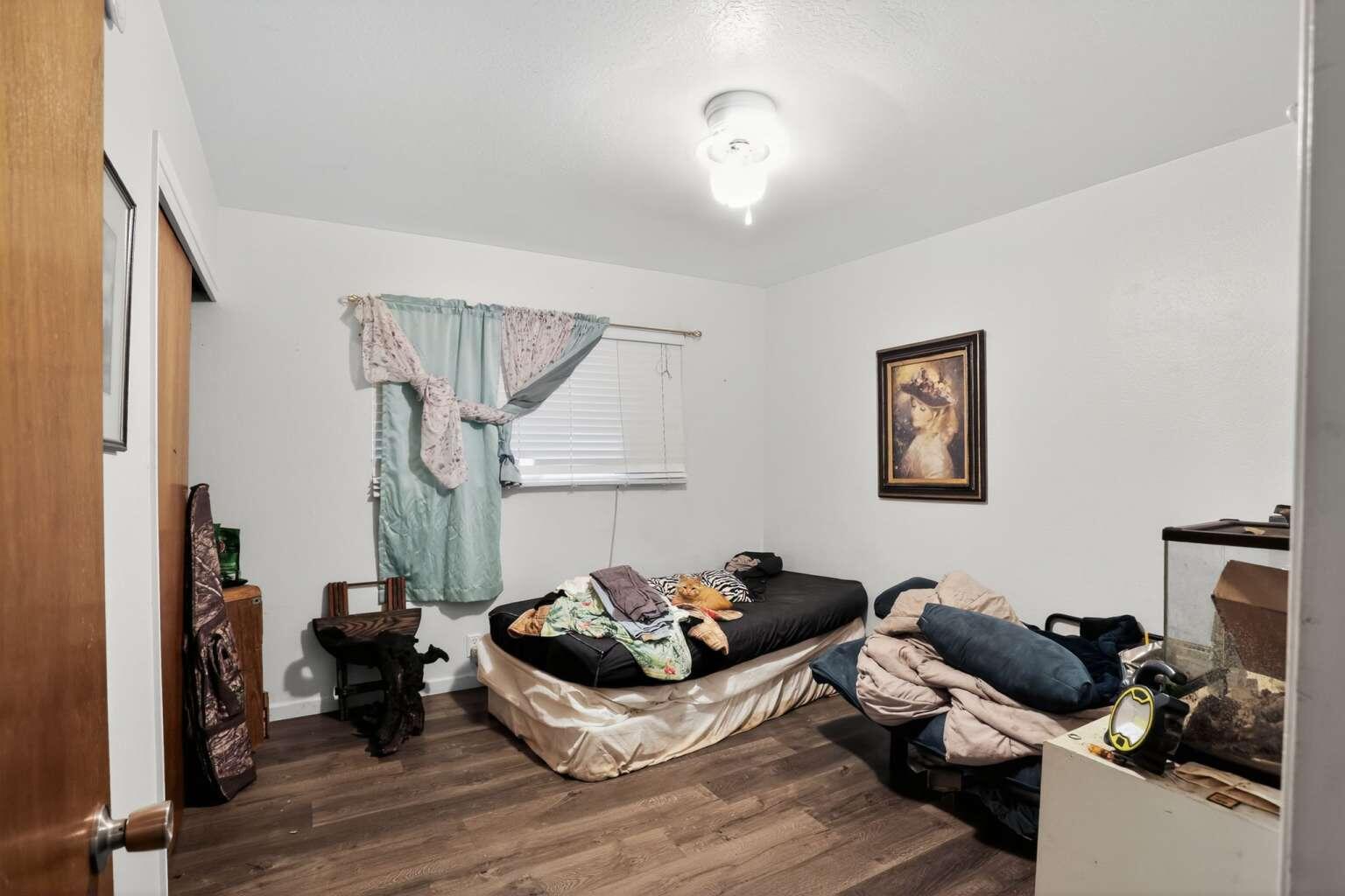 7408 Bridge Lane Redding, CA 96002 - Photo 3 of 25 a living room with furniture and a wooden floor