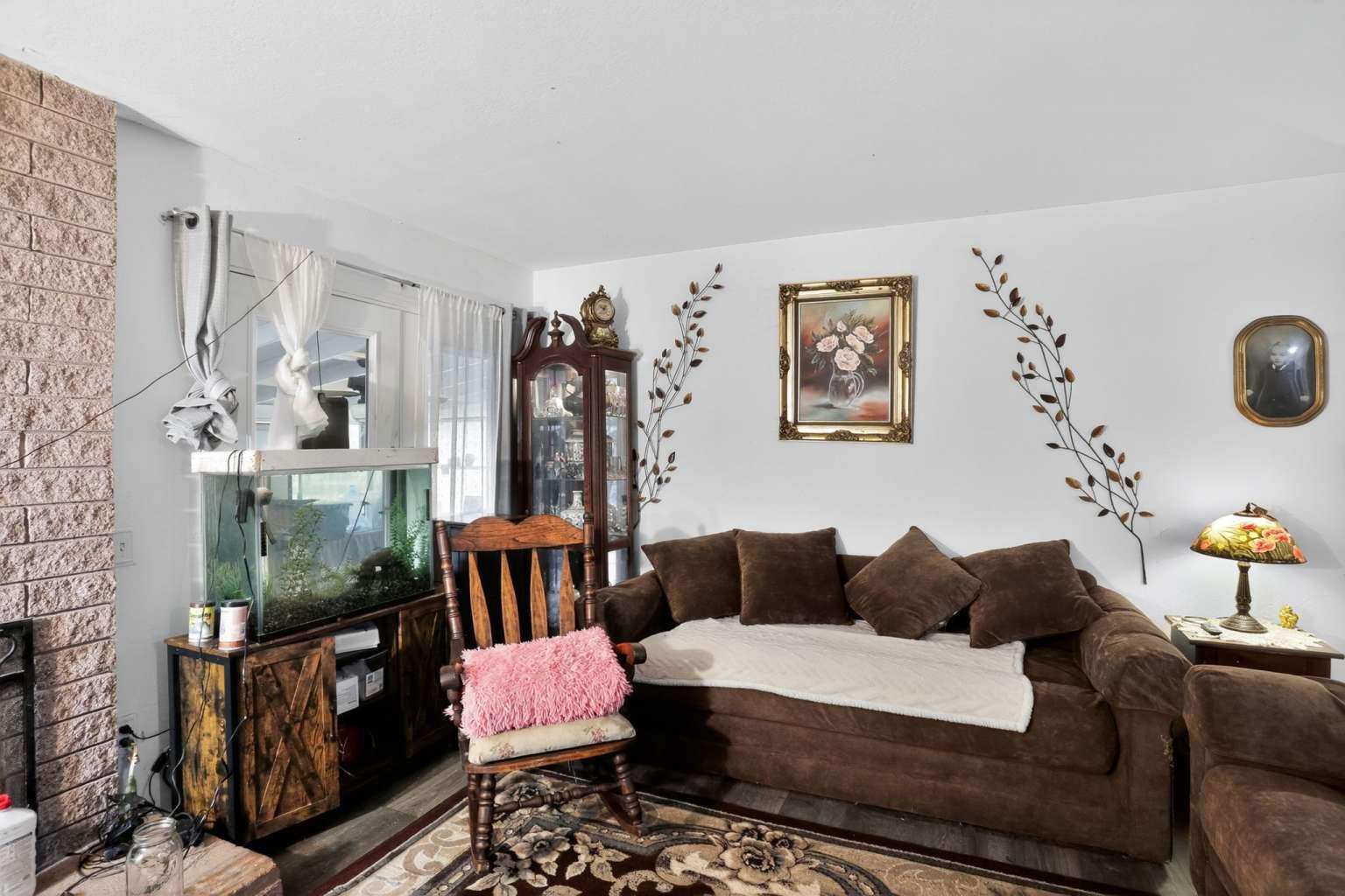 7408 Bridge Lane Redding, CA 96002 - Photo 8 of 25 a living room with furniture and a window