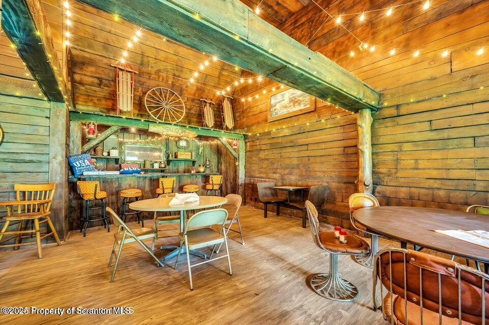 2694 Ransom Road Clarks Summit, PA 18411 - Photo 7 of 16 a view of a patio with table and chairs and potted plants