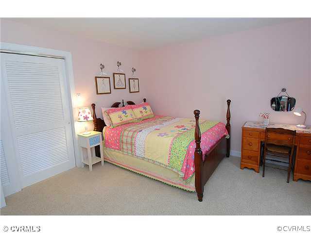 1939 Albion Road Midlothian, VA 23113 - Photo 11 of 18 a bedroom with a bed and a desk