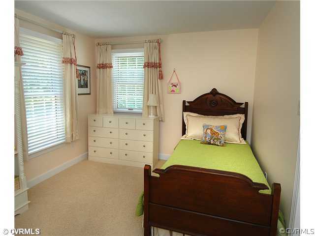 1939 Albion Road Midlothian, VA 23113 - Photo 13 of 18 a bedroom with a bed and two windows