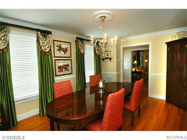 1939 Albion Road Midlothian, VA 23113 - Photo 2 of 18 a view of a dining room with furniture and a chandelier