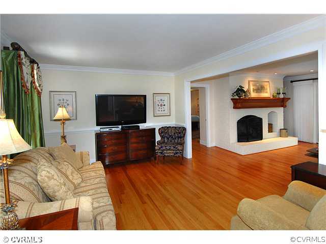 1939 Albion Road Midlothian, VA 23113 - Photo 5 of 18 a living room with furniture and a flat screen tv