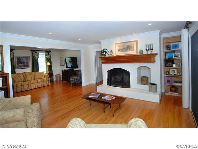 1939 Albion Road Midlothian, VA 23113 - Photo 7 of 18 a living room with furniture and a fireplace