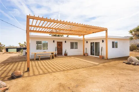 a view of a house with a patio