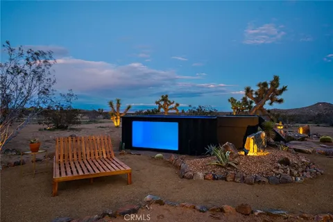 a view of outdoor space with seating area